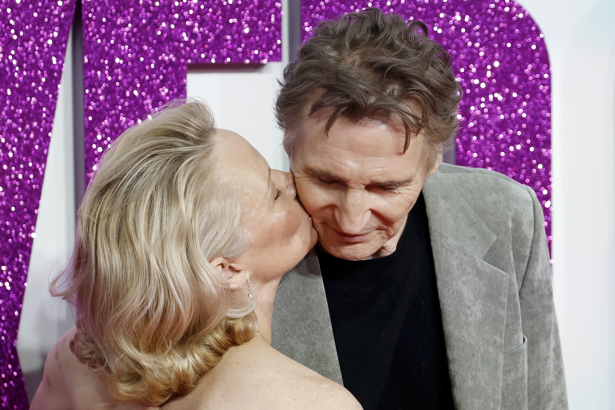 Liam Neeson Gives Pamela Anderson a Forehead Kiss in 'Naked Gun' Promo